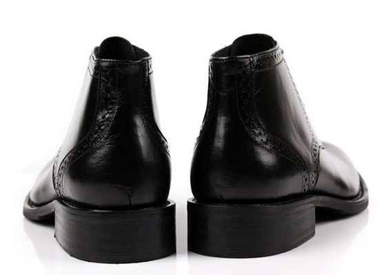 Boots à chevilles pour hommes en cuir à grain entier à orteils ronds en noir et marron