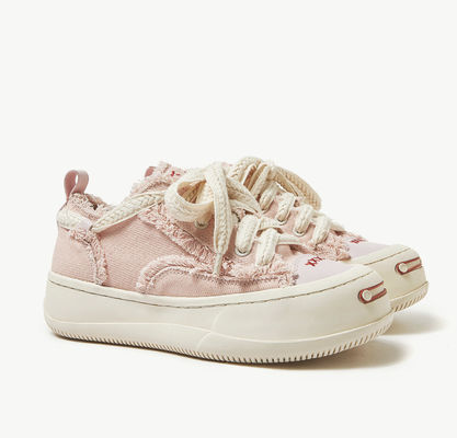 Blanc / Noir Des chaussures de sport respirantes pour femmes Des chaussures de sport en toile rondes