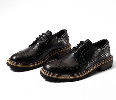 Chaussures décontractées de printemps / automne pour hommes chaussures à talons ronds pour hommes chaussures à talons noirs en cuir