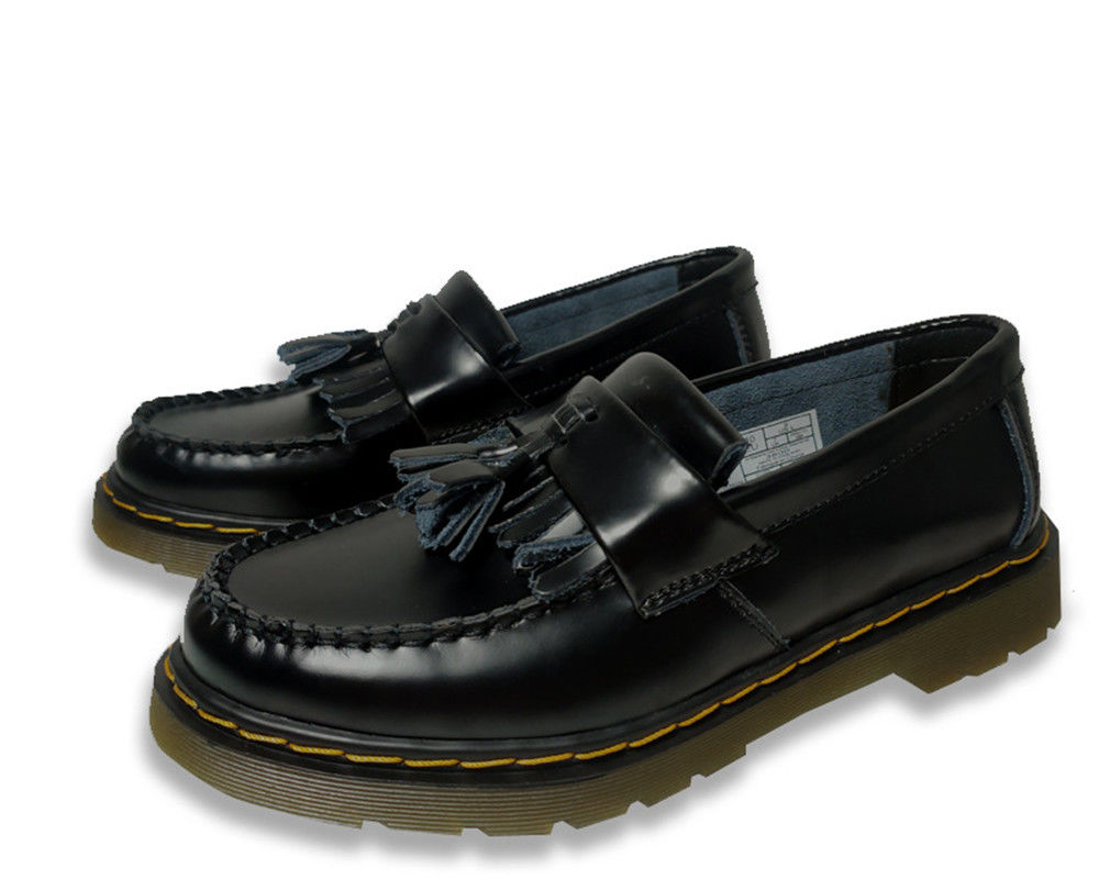 Des lunettes en cuir Adrian Tassel pour femmes noires, taille personnalisée pour les occasions formelles et décontractées.